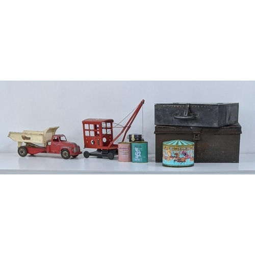 383 - A mid 20th century Buddy Hydraulic dump truck, along with a crane, together with two tin storage box... 