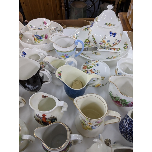 408 - A collection of approx. fifty milk and cream jugs to include Aynsley, Royal Albert and Aynsley Cotta... 