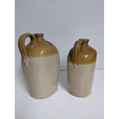 415 - Two Nicholson & Sons of Maidenhead wine and spirit merchants stoneware flagons
Location:G (store - o... 