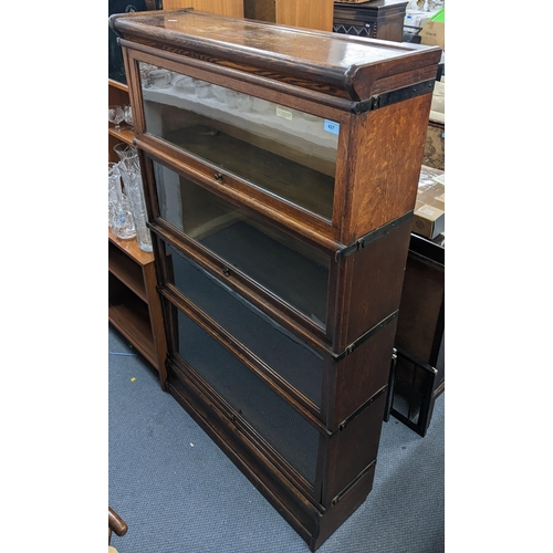 427 - An early 20th century Globe Wernicke oak four tier bookcase, 144h x 86.5w
Location:A3F