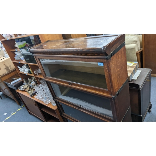 427 - An early 20th century Globe Wernicke oak four tier bookcase, 144h x 86.5w
Location:A3F