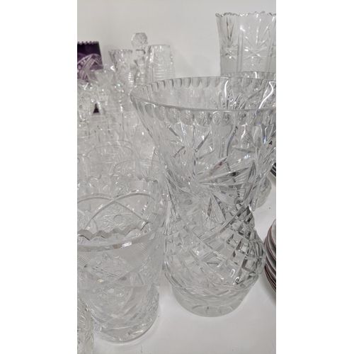 436 - A mixed lot of glassware to include mostly crystal cut glass to include various drinking glasses, va... 