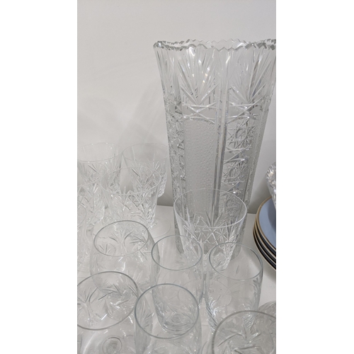 436 - A mixed lot of glassware to include mostly crystal cut glass to include various drinking glasses, va... 