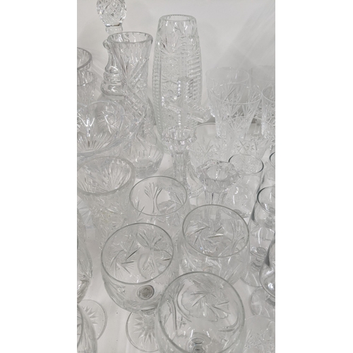 436 - A mixed lot of glassware to include mostly crystal cut glass to include various drinking glasses, va... 