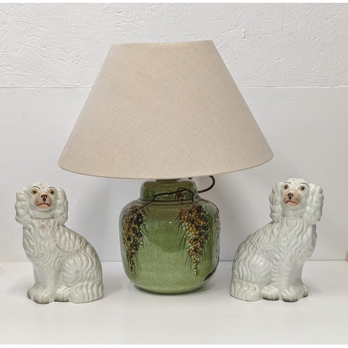 440 - A green glazed lamp with flowers decoration and a pair of Staffordshire dog
Location:BWR