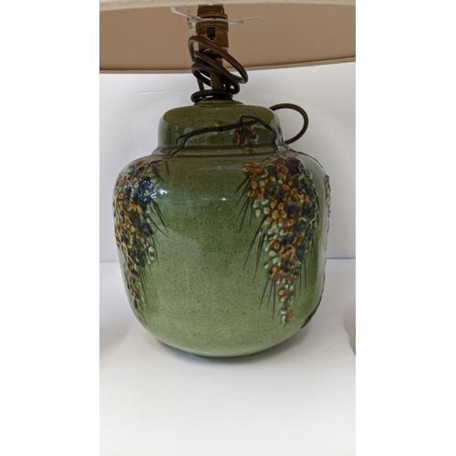 440 - A green glazed lamp with flowers decoration and a pair of Staffordshire dog
Location:BWR