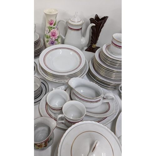 444 - A mixed ceramics to include a dinner/tea service along with a part dinner service having a floral de... 