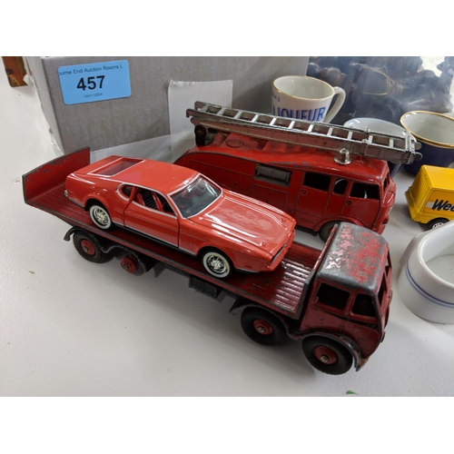 457 - A mixed lot of collectables to include talking machine toys, vintage model vehicles, a Delft model f... 