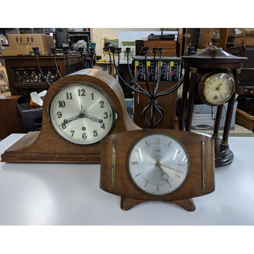 462 - Three clocks to include a Napoleons hat, an Art Deco inspired Metamec and a Portio clock
Location:A1... 