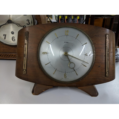 462 - Three clocks to include a Napoleons hat, an Art Deco inspired Metamec and a Portio clock
Location:A1... 