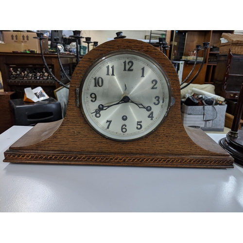 462 - Three clocks to include a Napoleons hat, an Art Deco inspired Metamec and a Portio clock
Location:A1... 