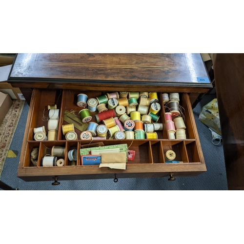 469 - An Edwardian rosewood combination games and work table having a fold over top and marquetry inlaid, ... 