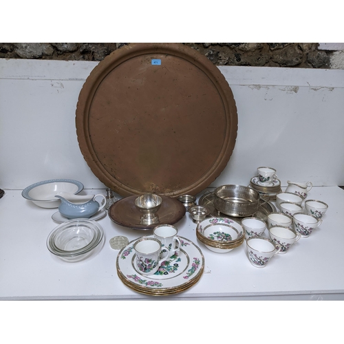 471 - A selection of silver plate, a copper charger, and tableware to include a Duchess Indian Tree patter... 