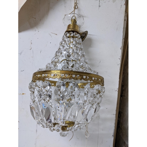 479 - A gilt metal ceiling bag light with faceted glass drops Location:G