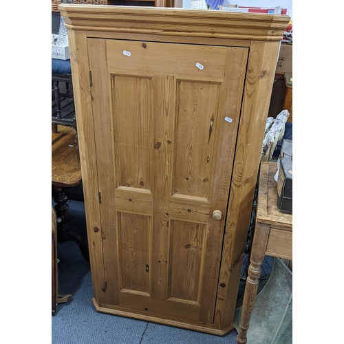 491 - A pine panelled single door corner cabinet fitted with four shelves, 136cm h x 74cm w
Location:A2M