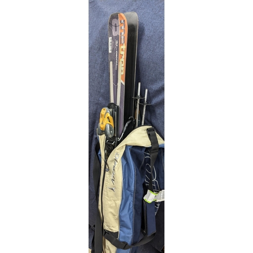 497 - Atomic M2 154-1080 skis with binding, poles and bag
Location:RAM