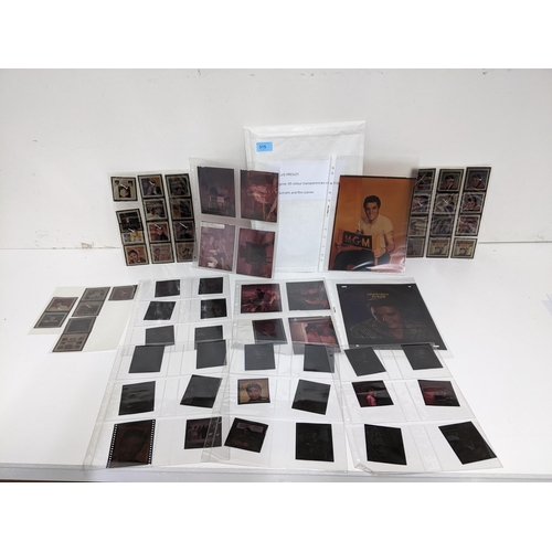 315 - A group of approx. 65 colour transparencies of Elvis Presley in film and portrait scenes Location:1.... 