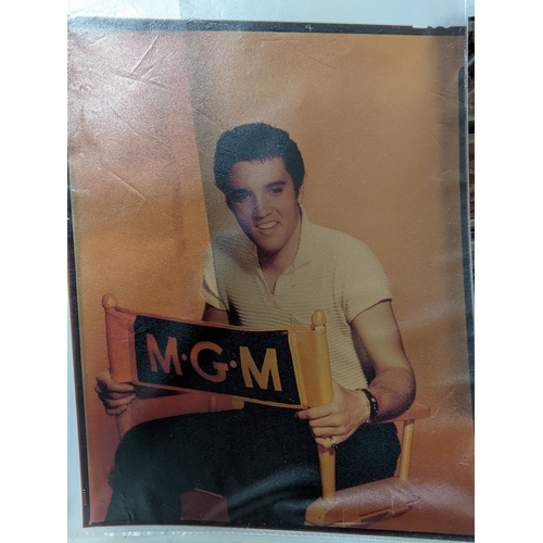 315 - A group of approx. 65 colour transparencies of Elvis Presley in film and portrait scenes Location:1.... 