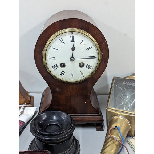 26 - A mixed lot to include a balloon shaped mantle clock, drawing set, postcards brass lantern and other... 