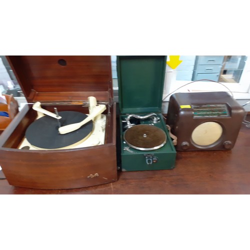 195 - A vintage Pye record player, a vintage Bush radio, a green cased gramophone and 4 cases of vintage g... 