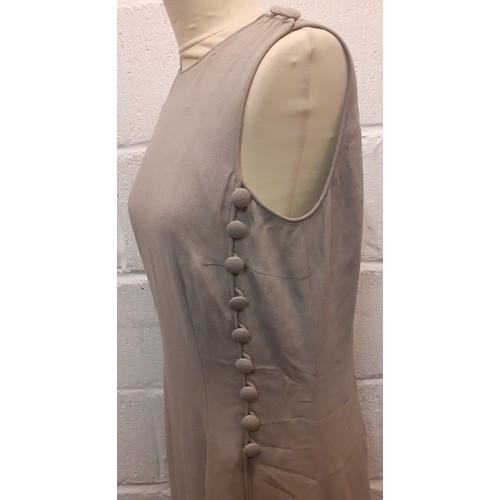 33 - Giorgio Armani-A late 20th Century ladies full length Vestimenta spa taupe sleeveless dress having a... 