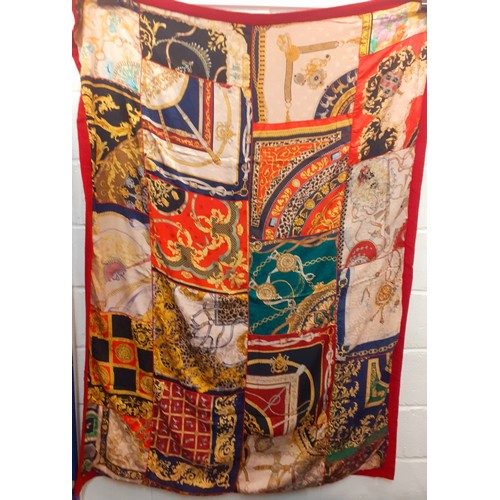 147 - A Renata Balestro silk and wool throw with a Hermes influenced patchwork design on a red silk ground... 