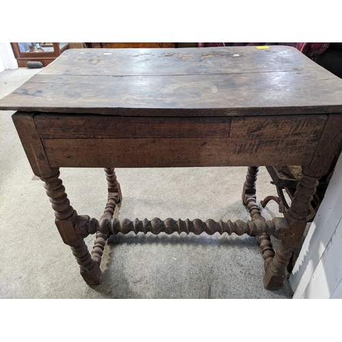 201 - A Georgian mixed wood lowboy, single drawer with brass handle, on bobbin turned and block legs and s... 