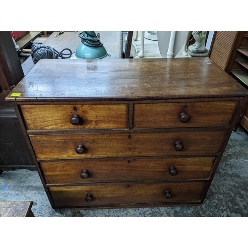 203 - A Victorian mahogany flat fronted chest of two short and three graduated drawers with bun handles 89... 