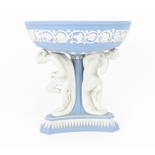 A Wedgwood Masterpieces Collection jasperware Michelangelo pedestal bowl, after the 1880 model, 1980, limited edition 61/100, the circular bowl with white rosettes and foliate scrolls sitting on a tripartite base with three classical male figures, with gilt inscription and impressed factory marks to underside, 23.5 cm high x 22 cm diameter