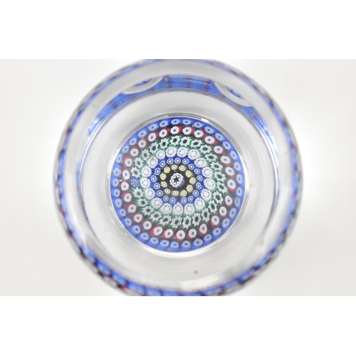 28 - A Whitefriars millefiori 1970s paperweight, window cut of cylindrical form with flat top, dated in t... 