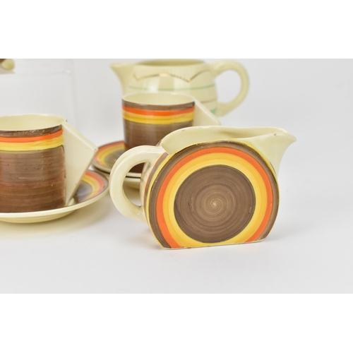 5 - A 1930s Clarice Cliff Newport Pottery Bizarre pattern coffee set in the 'Liberty Stripe' pattern, co... 