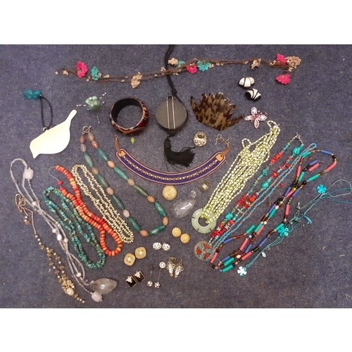 160 - A quantity of costume jewellery, mainly bead necklaces to include an Egyptian style leather and bead... 