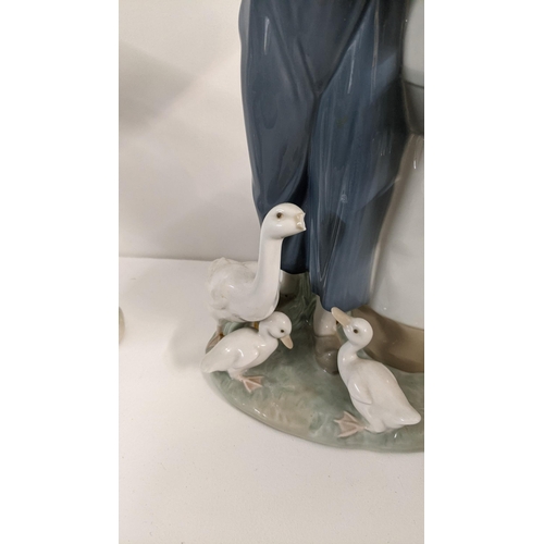 442 - Lladro Dutch children duck figurine, 37cm h A/F
Location:9.2