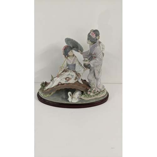 444 - A Lladro porcelain figurine group entitled Springtime in Japan, on plinth base
Location:11.2