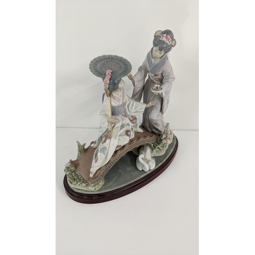 444 - A Lladro porcelain figurine group entitled Springtime in Japan, on plinth base
Location:11.2