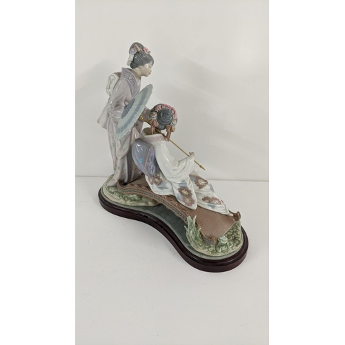 444 - A Lladro porcelain figurine group entitled Springtime in Japan, on plinth base
Location:11.2