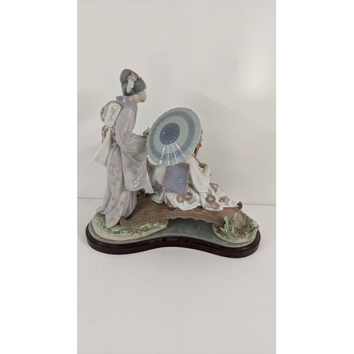 444 - A Lladro porcelain figurine group entitled Springtime in Japan, on plinth base
Location:11.2