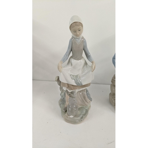 449 - Lladro Nao girl with broken jug figurine, 30cm h together with Lladro girl with rabbit figure and ot... 