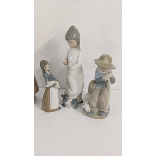 449 - Lladro Nao girl with broken jug figurine, 30cm h together with Lladro girl with rabbit figure and ot... 