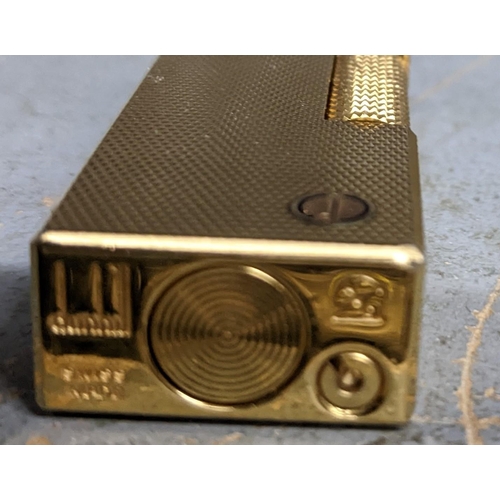 472 - A Dunhill gold plated cigarette lighter Location:CAB1