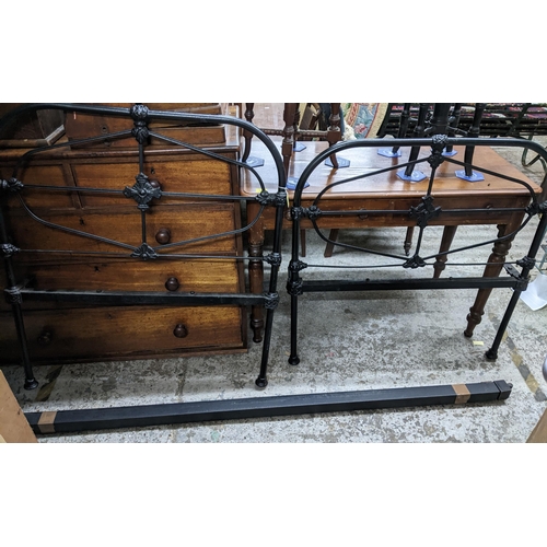 475 - Victorian black painted cast iron single bedhead and footboard, and side irons
Location:G