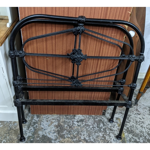 475 - Victorian black painted cast iron single bedhead and footboard, and side irons
Location:G