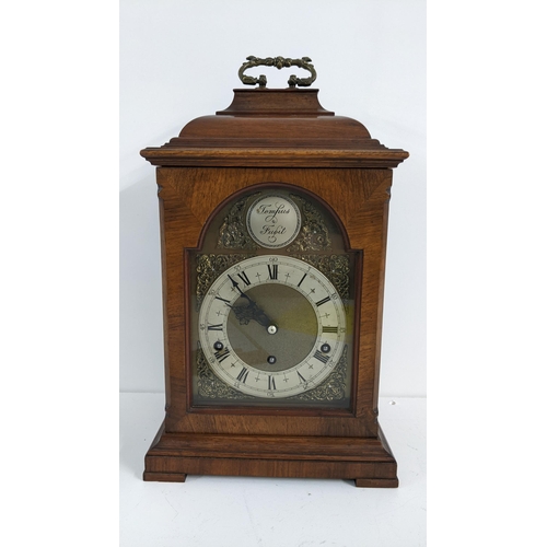 481 - A mid 20th century Tempus Fugit 8 day walnut mantle clock having a Swiss lever escapement and striki... 