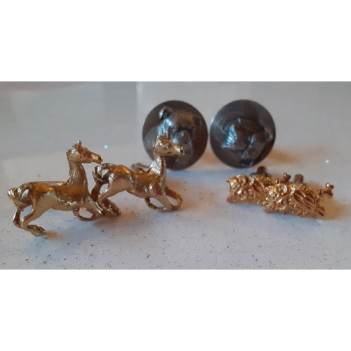 55 - A group of 20th Century cufflinks to include a pair of silver Bulldog cufflinks 21.6g, a pair of sil... 