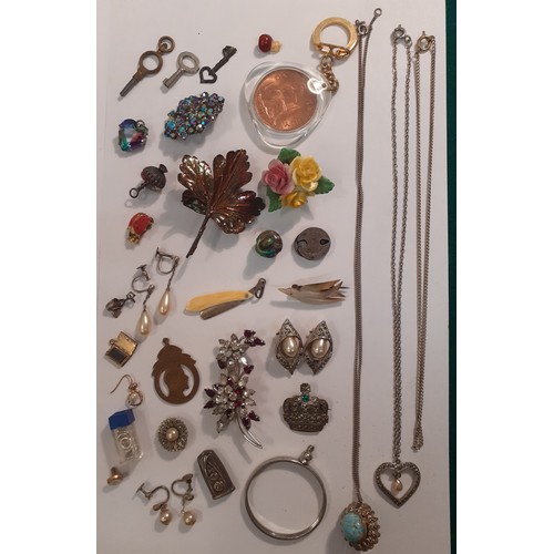 57 - A quantity of vintage costume jewellery to include 4 Aurora Borealis necklaces, simulated pearl neck... 