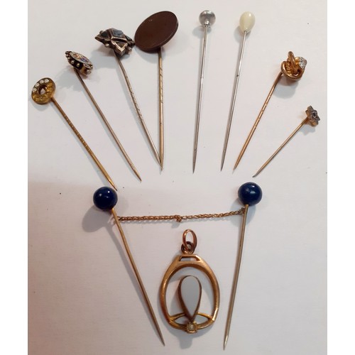 58 - A collection of 20th Century hat pins to include a Scottish white metal and hard-stone example and a... 