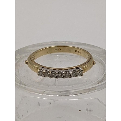 41 - A 9ct gold ring set with seven diamonds 3.1g
Location: CAB 4