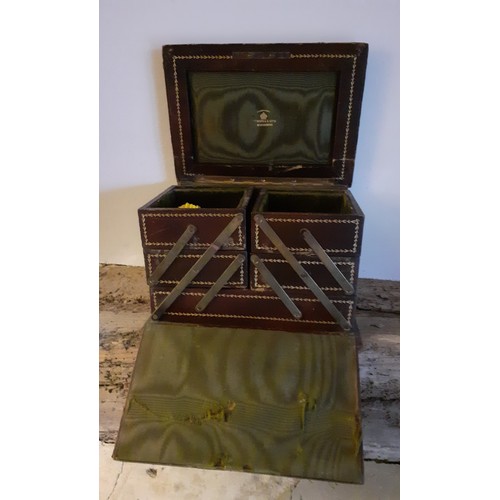 66 - An early 20th Century Edwards & Sons of Regent Street brown leather concertina jewellery box with gr... 