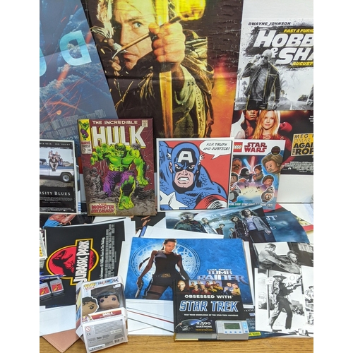 355 - Film memorabilia - a collection of film related items to include photos, lobby cards, toys, brochure... 