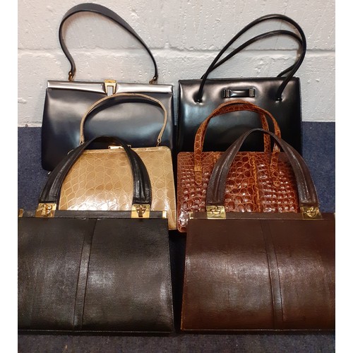 117 - A group of vintage handbags to include 2 1950's black Waldybags, 2 Jane Shilton snakeskin bags and 2... 